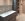 Binnenkijkers - Binnenkijken bij een terrazzo badkamer met wasmachine