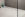 Binnenkijken bij een badkamer met badkamermeubel ribbelfront - Douchedetail en toiletruimte 
